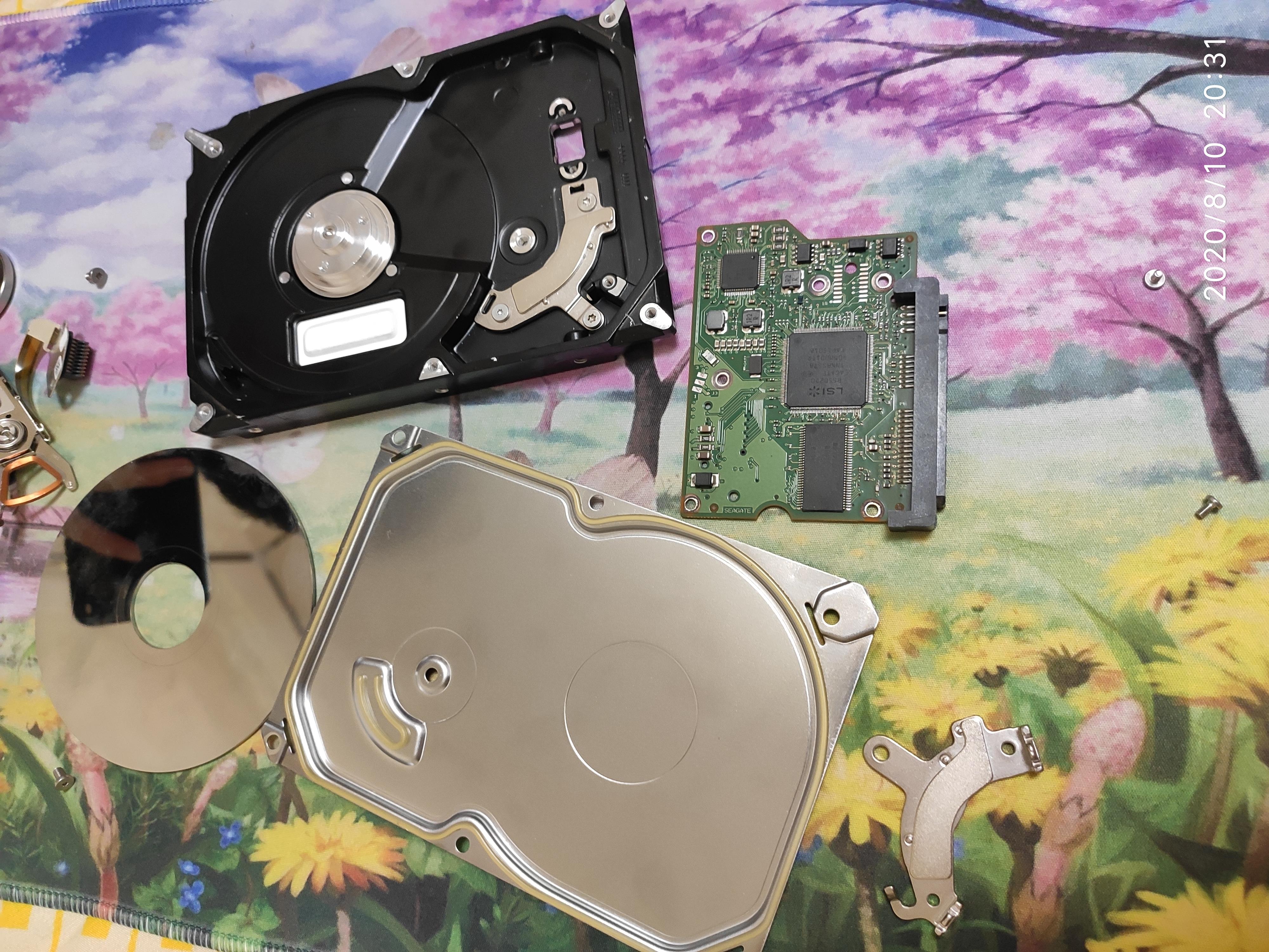 移动硬盘拆解做笔记本硬盘,电脑硬盘中的磁盘拆解