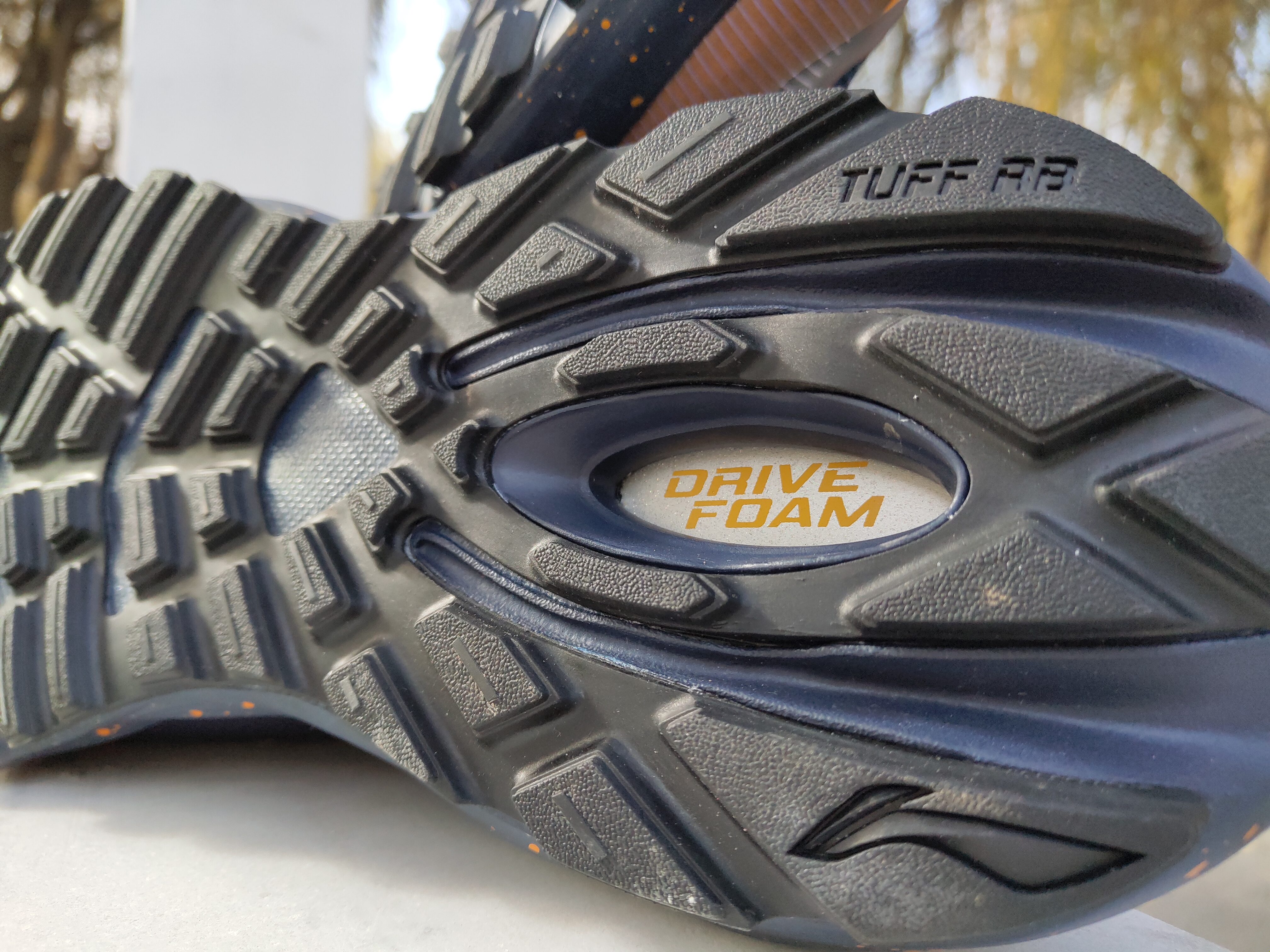 防雨雪运动鞋李宁,李宁无惧风雨