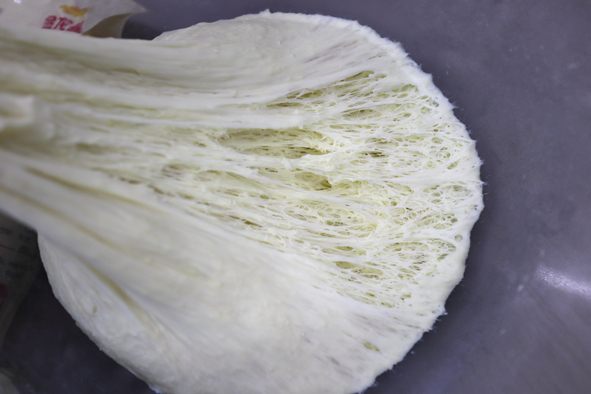 揉出了手套膜后如何做面包,用面包机揉手套膜后怎么烤