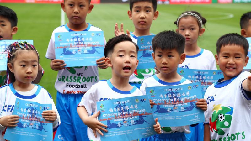 亚足联草根足球日大连站,为足球赛喝彩