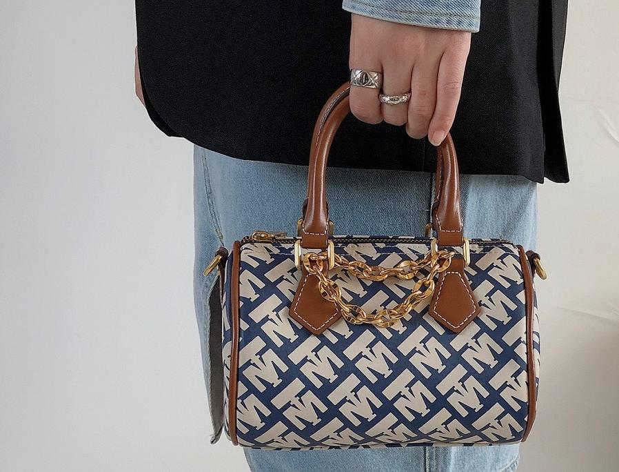 小ck和mk女包哪个好,小ck和ck的区别测试