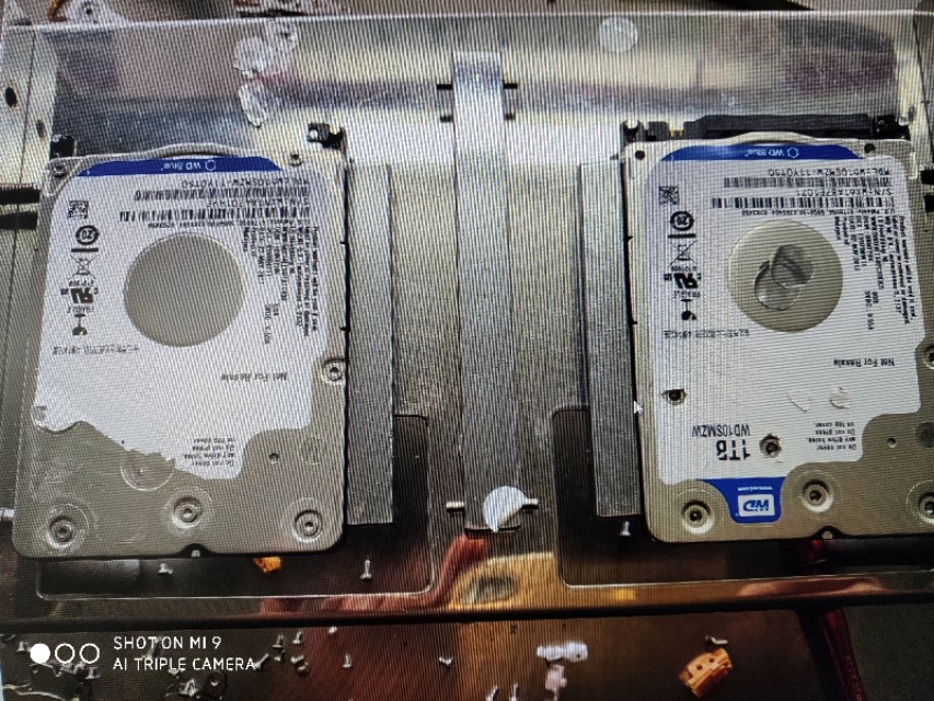 西数硬盘咔咔响的原因,移动硬盘摔了一下嗒嗒响无法识别