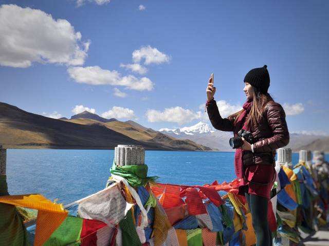 坐飞机去西藏落地后攻略,坐飞机去西藏一定要坐左边靠窗