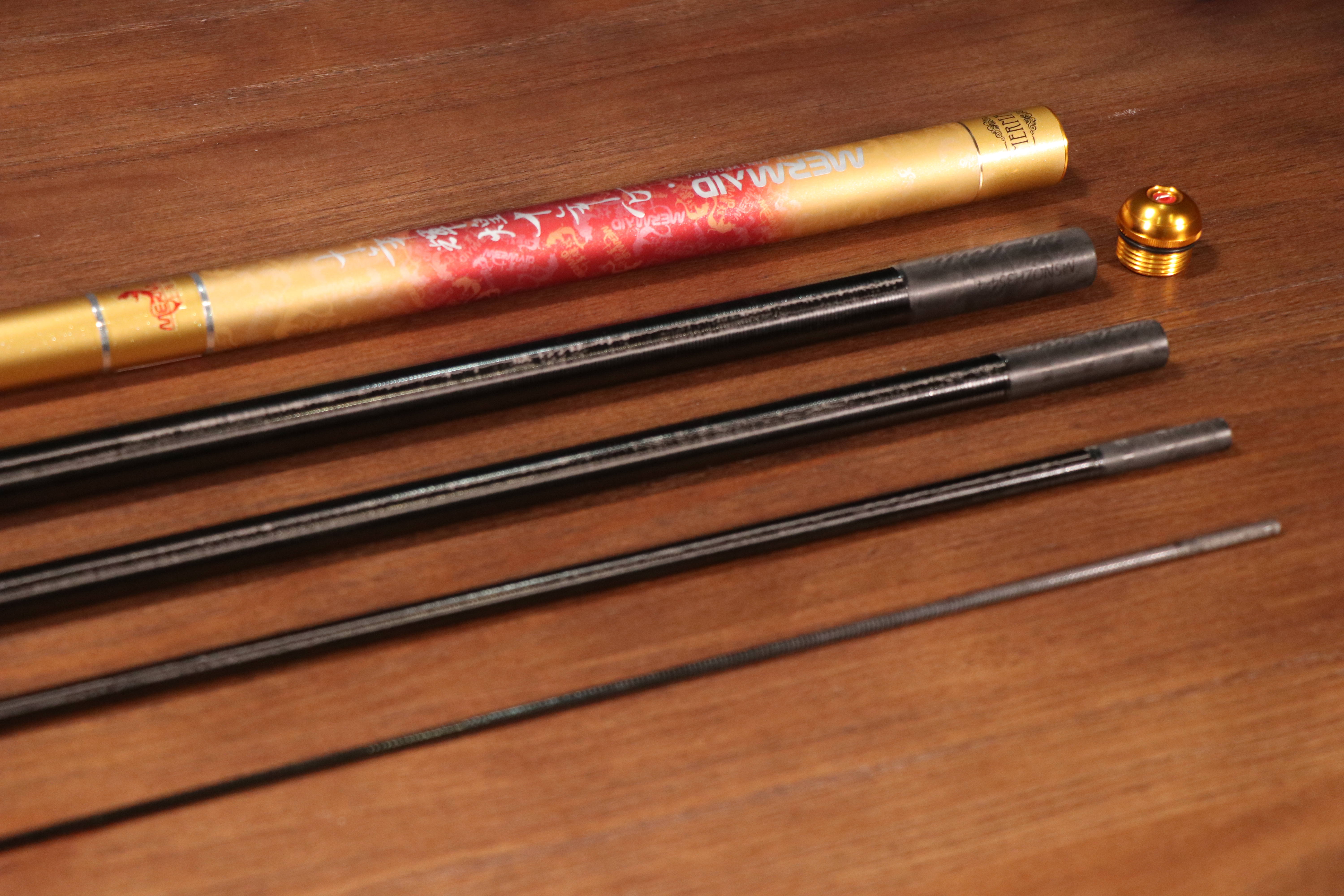 上海美人鱼十年情鱼线怎么样,美人鱼的99的钓竿一般都是啥样