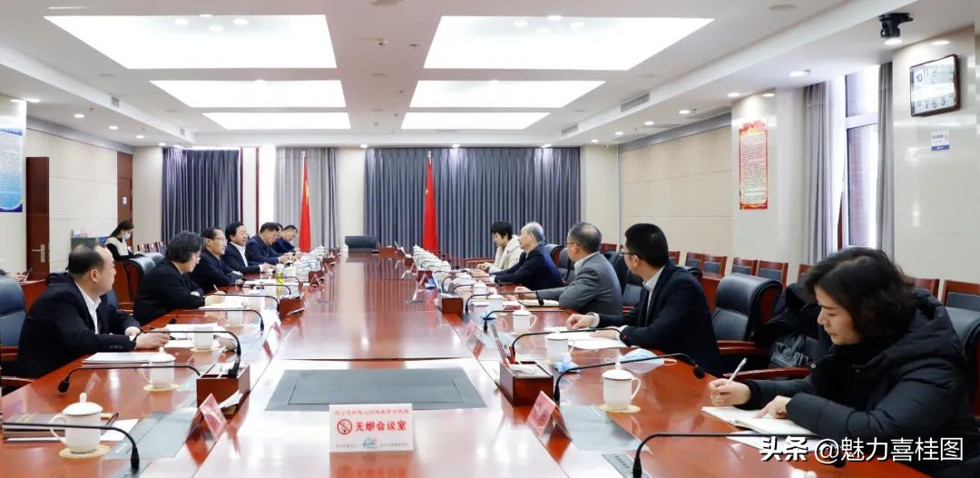 高闻何李新春会见江苏新誉集团董事长周立成一行