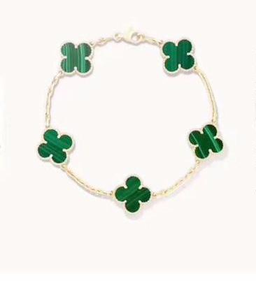 vancleefarpels梵克雅宝日月星辰手表,vancleefarpels梵克雅宝四叶草白色