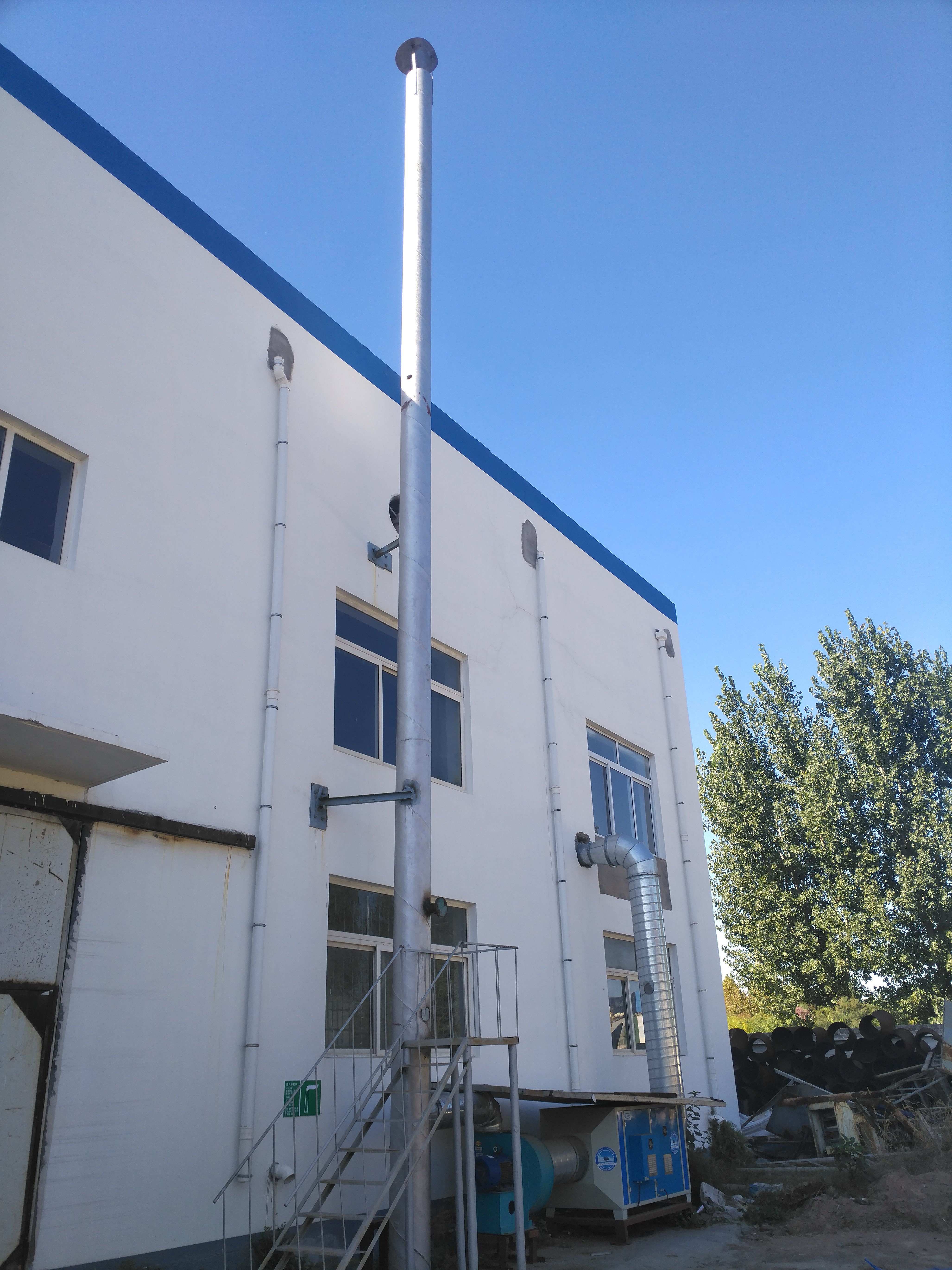 上人屋面烟囱高度标准,工厂的烟囱为什么要建那么高