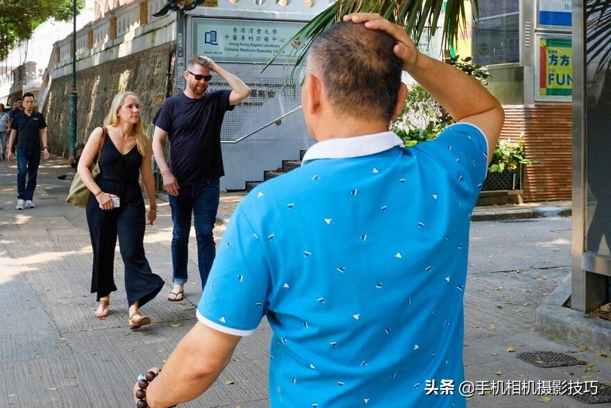 他被称为香港街拍之王：每一张照片都难以复制，诀窍在哪？