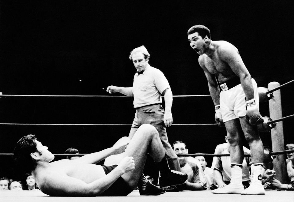 wwe比赛阿里,wwe拳王霍利菲尔德