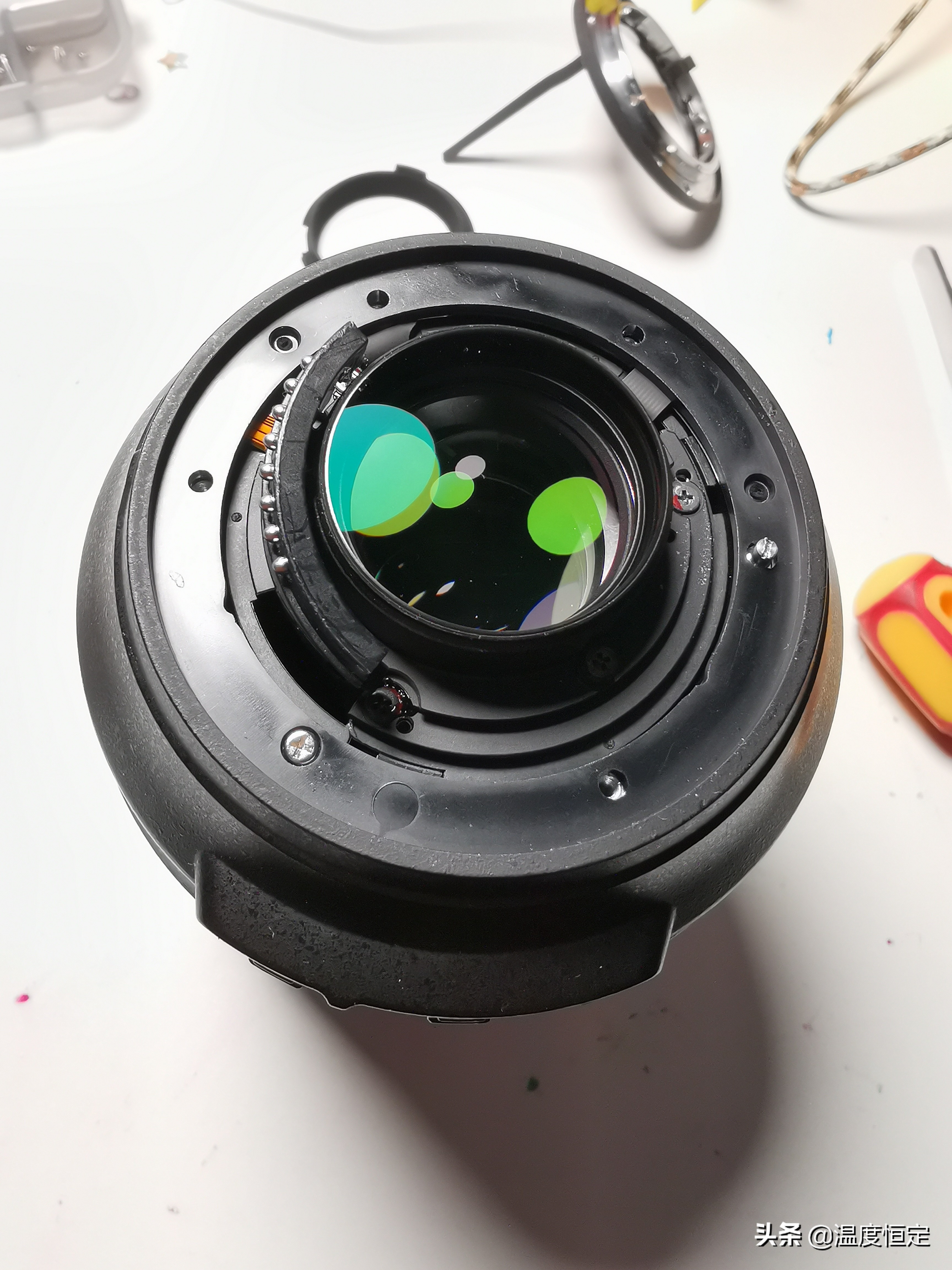 尼康镜头防抖打开一直响,尼康24-120镜头防抖怎么开