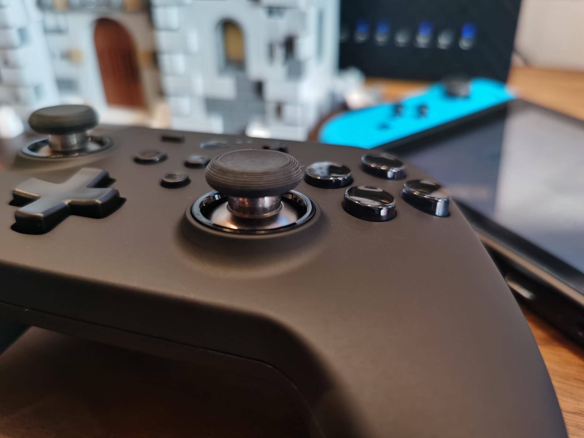 switch手柄对比谷粒金刚手柄,switchpro手柄淘宝200多