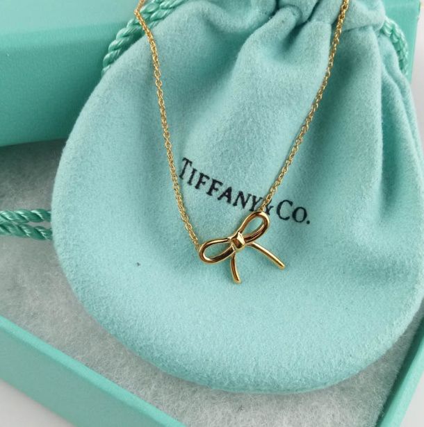 施华洛世奇和卡蒂罗项链哪个好,施华洛世奇项链爱心宝石经典款