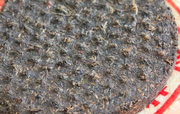 七子饼茶的历史背景,中茶牌七子茶饼铁饼