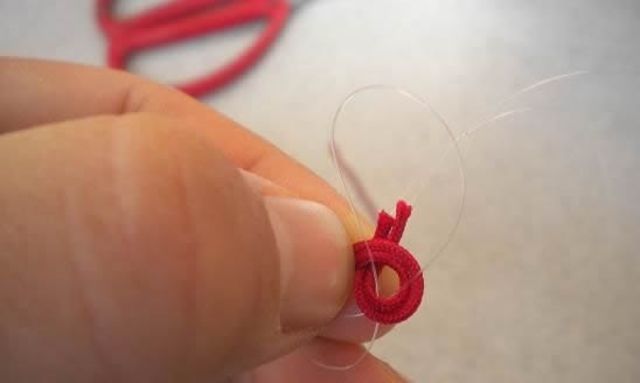 怎么把主线的断线绑在鱼竿上,主线断线打结方法