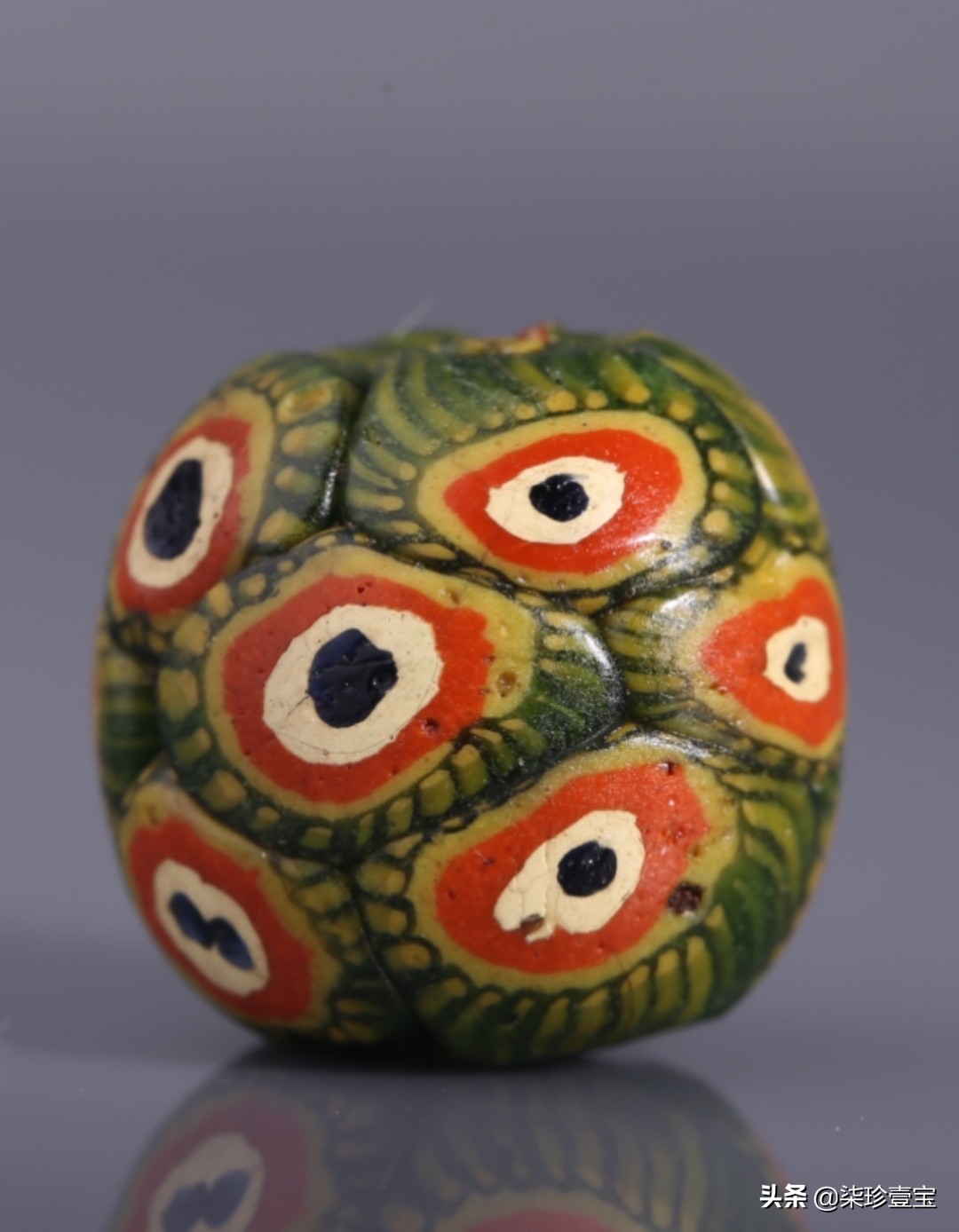【古玩收藏与鉴赏】怎样辨别蜻蜓眼琉璃珠真伪。