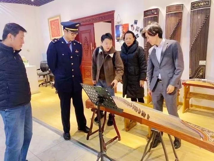 河南假冒的敦煌古筝质量怎么样,敦煌古筝吊牌真假