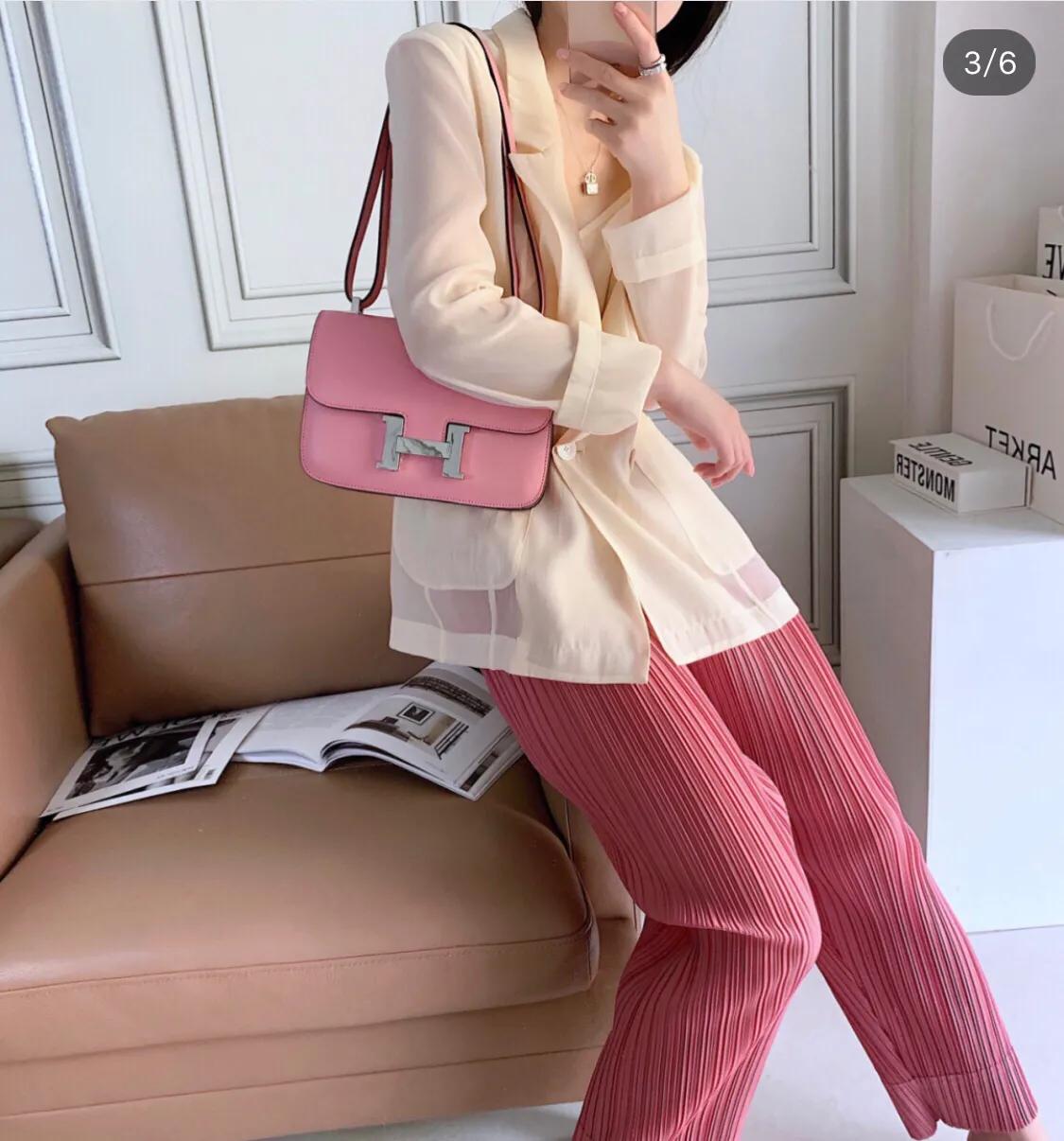 背高仿大牌丢人吗,背仿名牌包有用吗