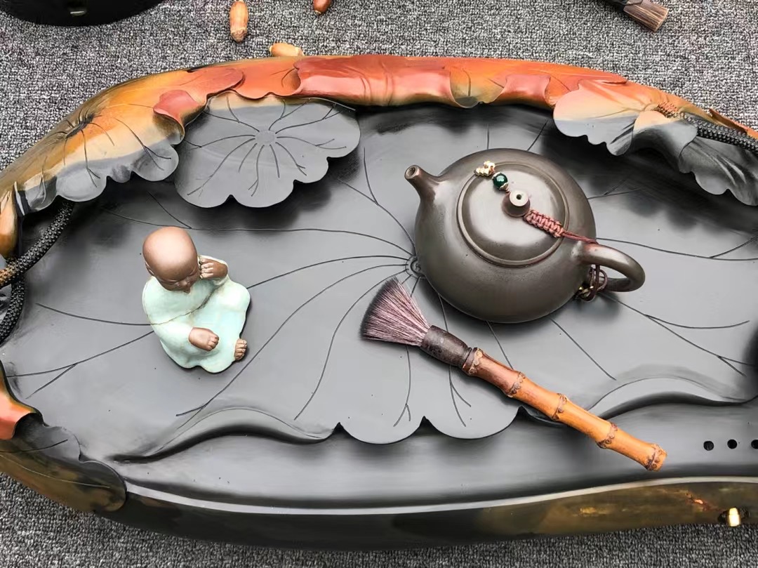 人工雕刻石茶盘,小伙子石头雕刻二十万