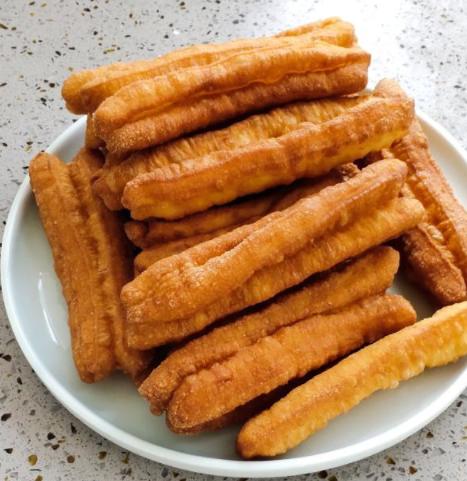 油条膨松剂做出的油条发硬,油条面粉做出来的油条凉了发硬