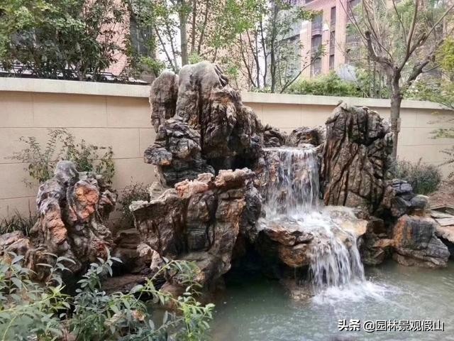 庭院西北方位鱼池假山种什么树,家庭制作假山鱼池在哪个方位好