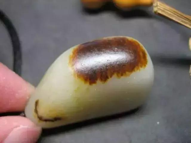 和田玉籽料皮造假对人身体有害吗,和田玉造假如何辨别