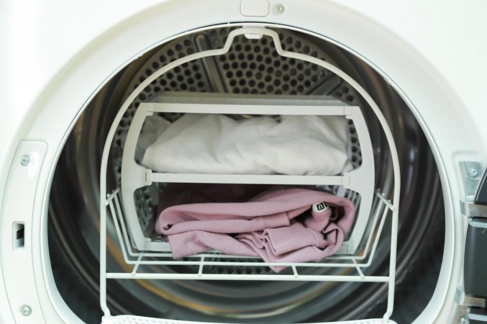 西门子烘干机烘完没有水,西门子烘干机开始怎么打开放衣物