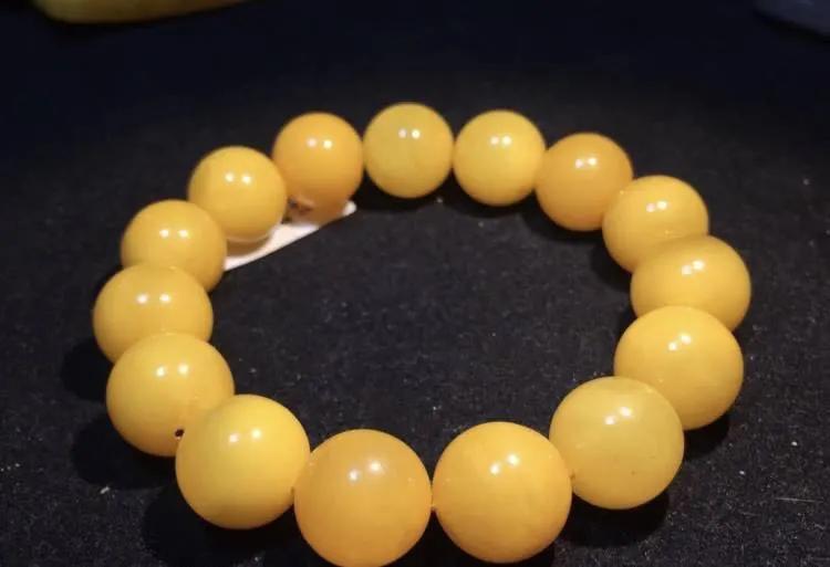 怎样鉴别鸡油黄蜜蜡的真假,真正的鸡油黄蜜蜡珠子图片