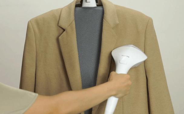 手持挂烫机卖货,手持挂烫机服装店大型