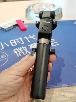 华为有线自拍杆的使用方法及操作,华为手机用自拍杆的使用方法图解