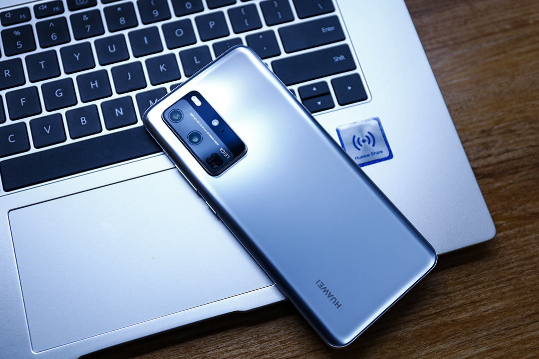 华为p40pro与mate40rs保时捷对比,华为p40pro和vivox70pro哪个好