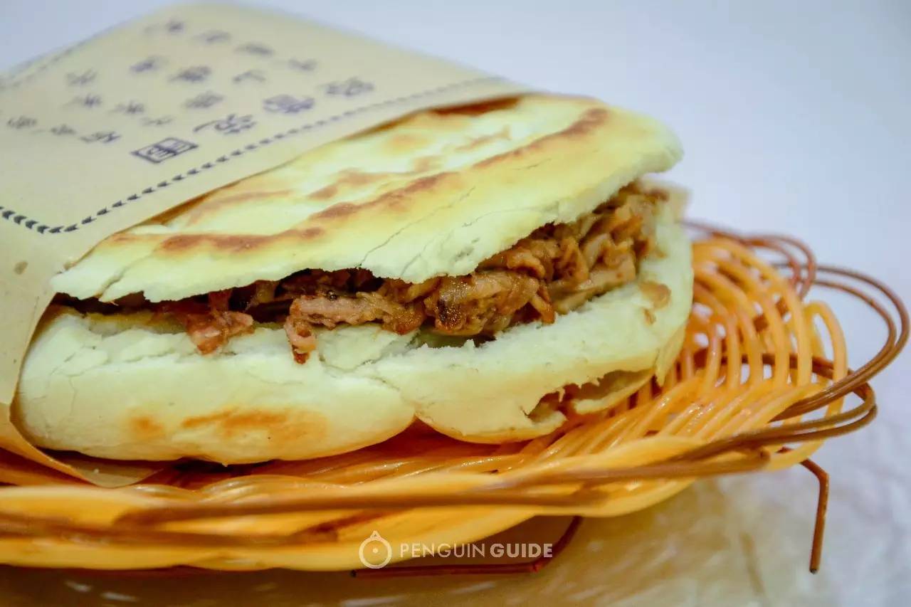 吃西安肉夹馍图片,吃西安肉夹馍视频