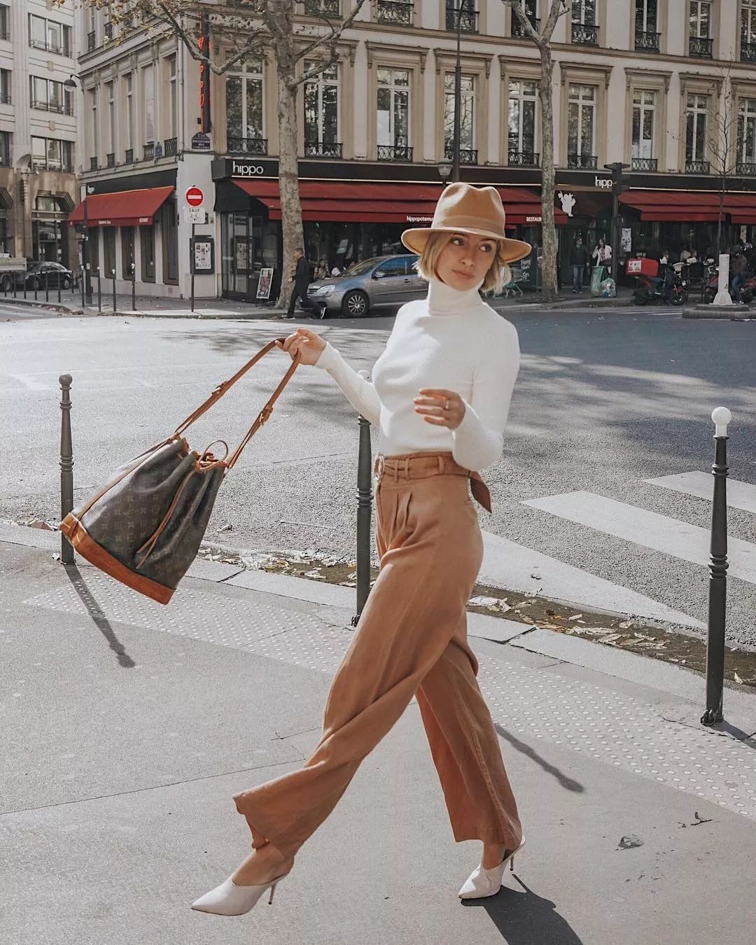 会背奢侈品包包,会背水桶包的人