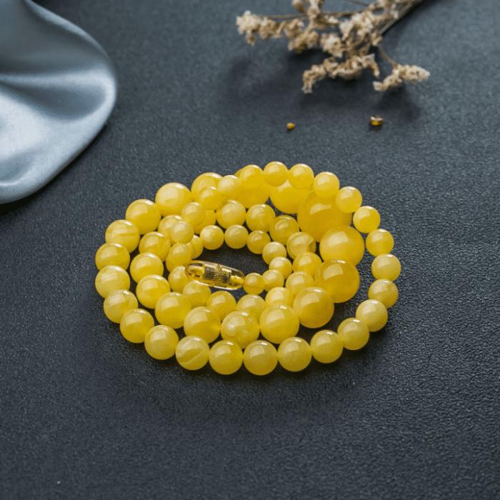 怎么鉴别二代蜜蜡和天然蜜蜡区别,二代蜜蜡原石怎么辨别