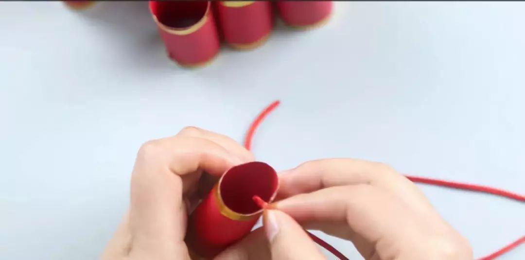 元旦节手工纸灯笼鞭炮,元旦手工立体鞭炮