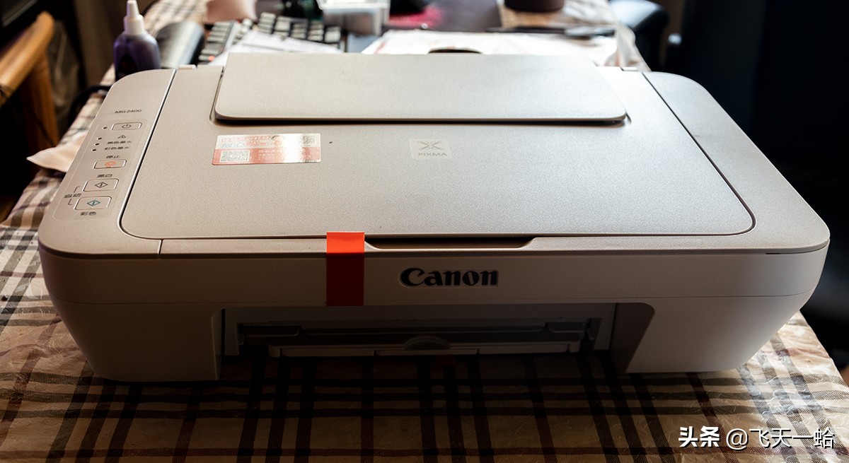 佳能g2820打印机评测,佳能2400打印机换墨盒