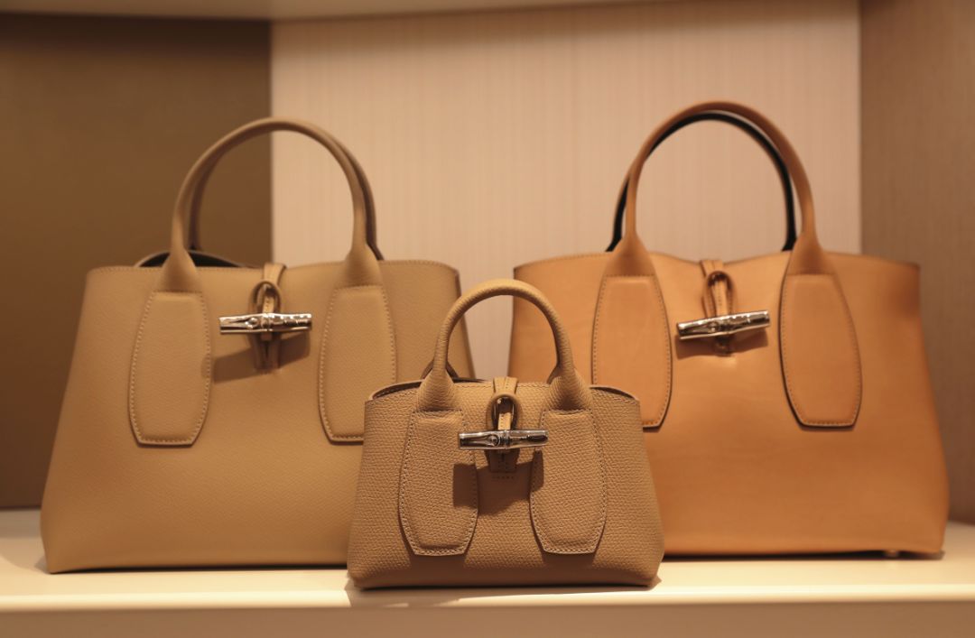 珑骧的包包怎么样好看吗,珑骧包包硬吗