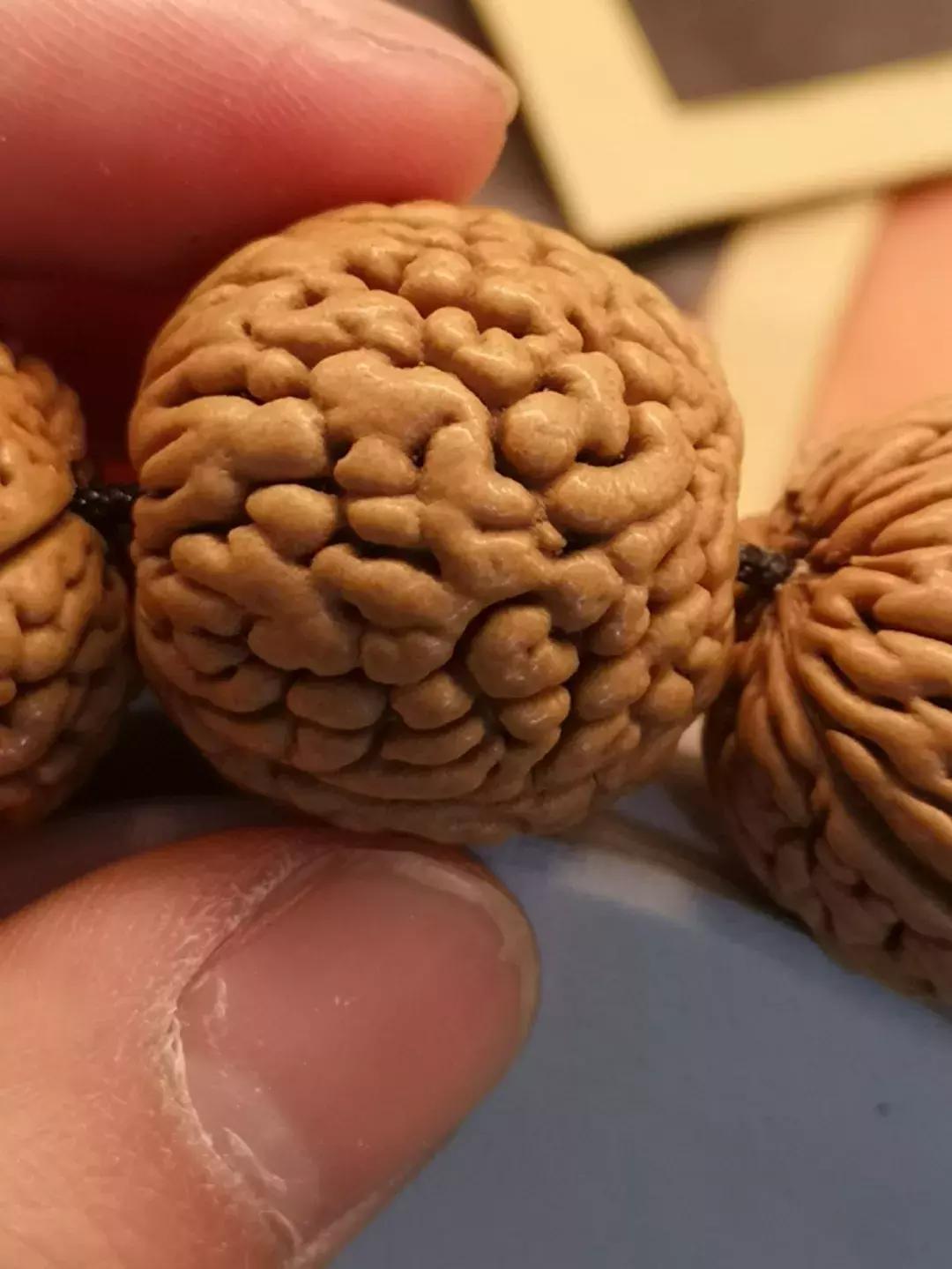 桃核光珠怎么挑选才是正确的,怎样挑选真正的桃核手串