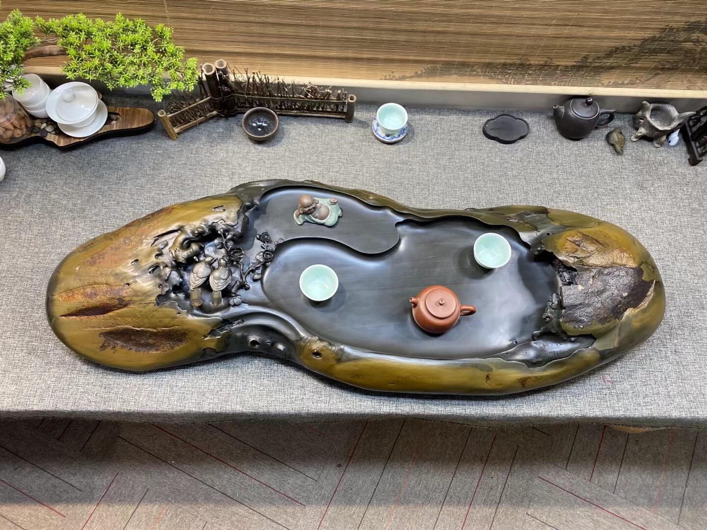 树桩石头雕刻高山流水,把石头雕成蝴蝶