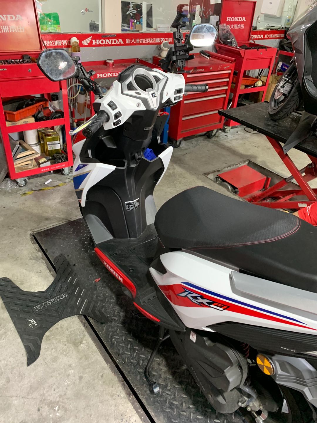 本田裂行125踏板有防盗报警功能吗,新大洲本田裂行125踏板评测