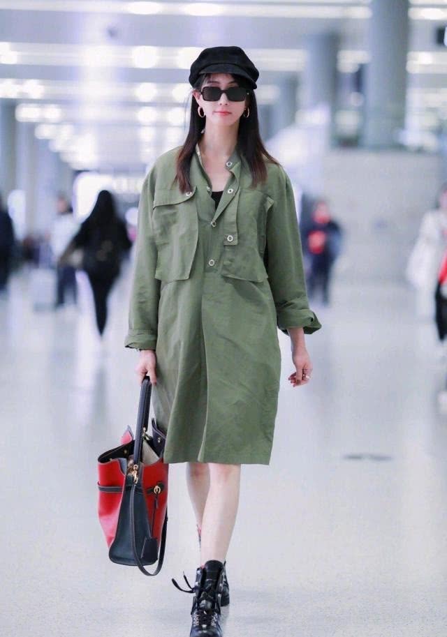 听说长T恤显矮，张钧甯把外套“缩短”30厘米，瞬间变高太机智