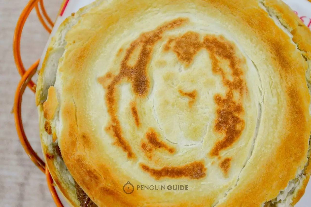 吃西安肉夹馍图片,吃西安肉夹馍视频