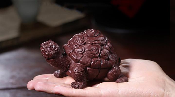 两只小船茶宠寓意什么,茶宠猪的寓意和象征