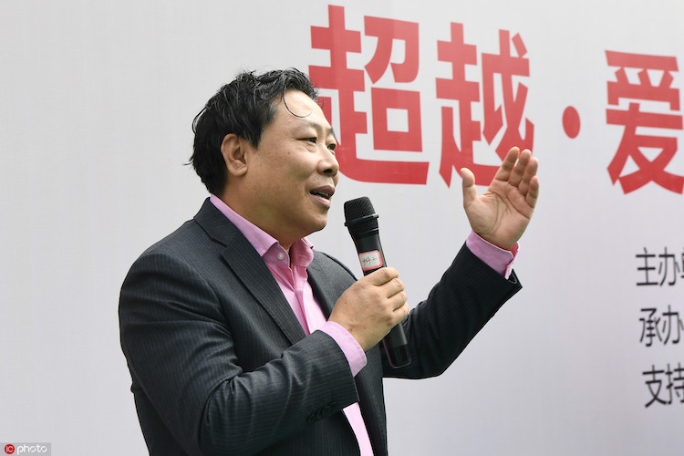 超越•爱”系列公益活动中超联赛走进重庆市渝北区特殊教育学校