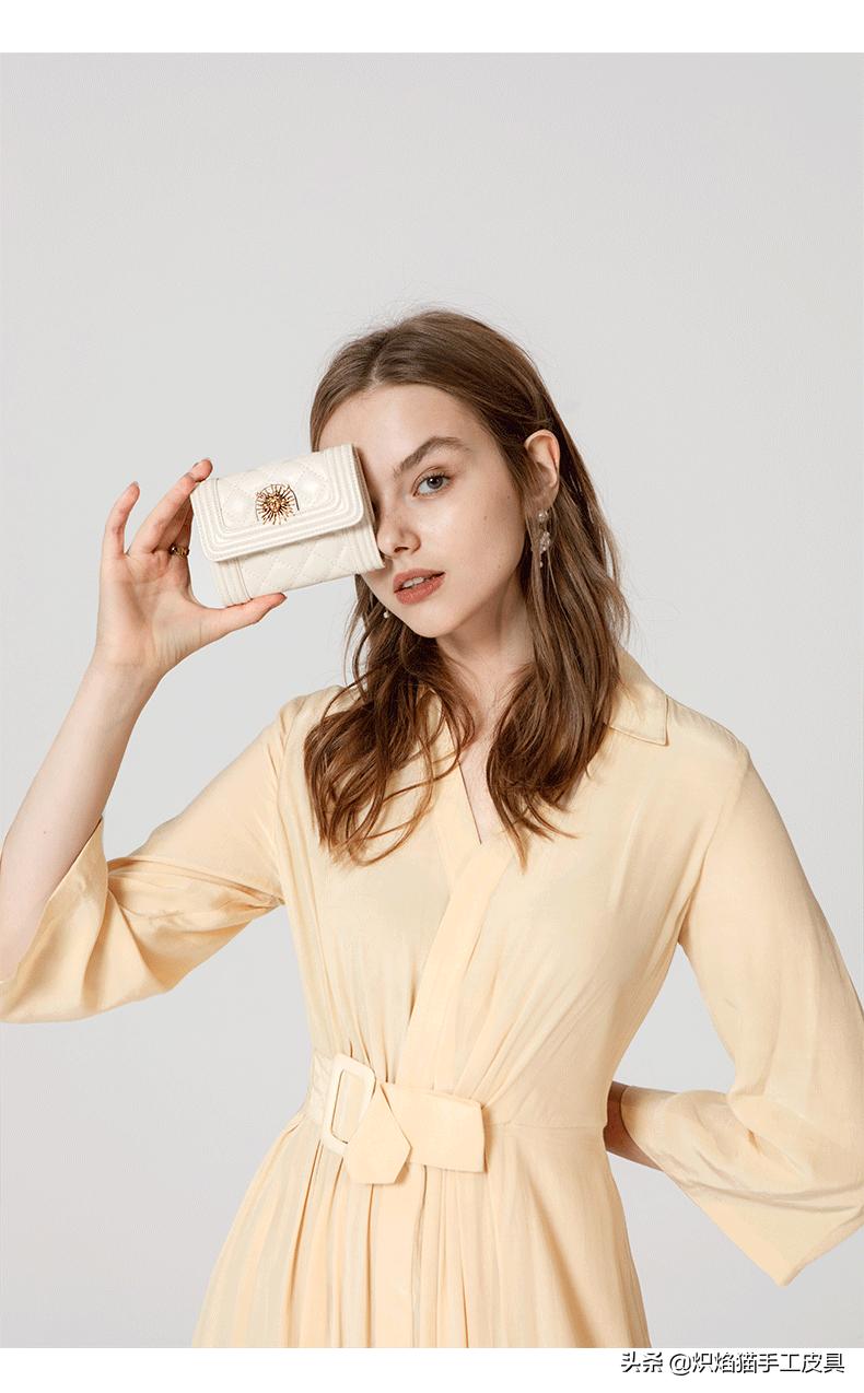 太阳神复古菱形格零钱包