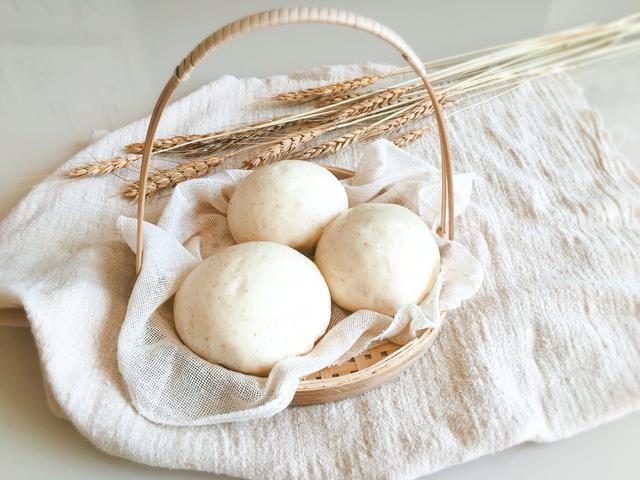 自己蒸的馒头有嚼劲不蓬松,自己蒸的馒头有点粘是怎么回事