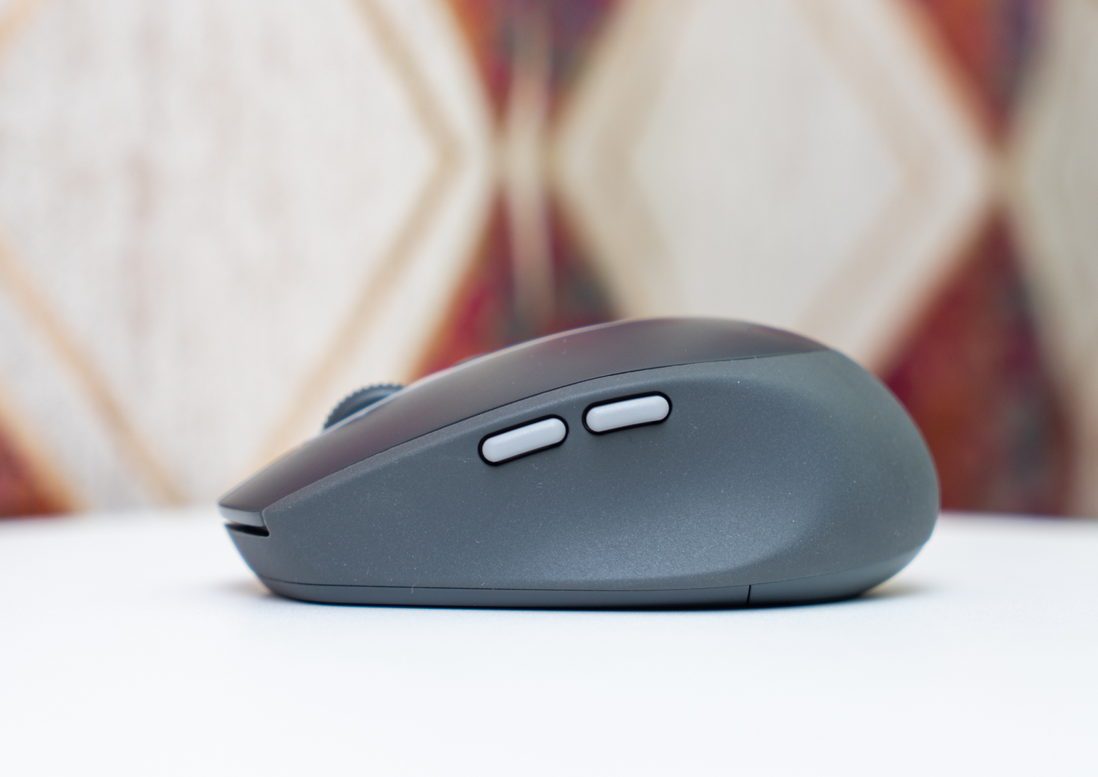 罗技m590鼠标如何设置功能键,罗技m590鼠标完全拆解