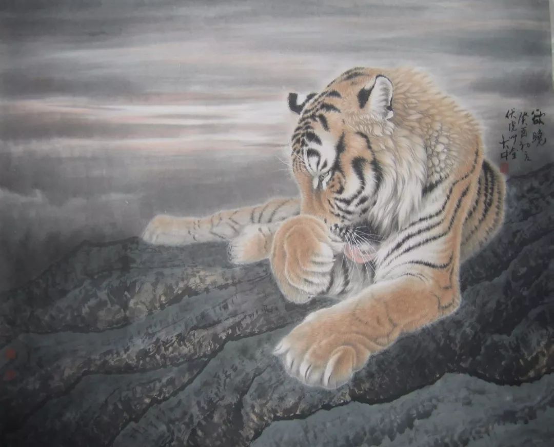 他笔下的虎充满了人的柔情与善意