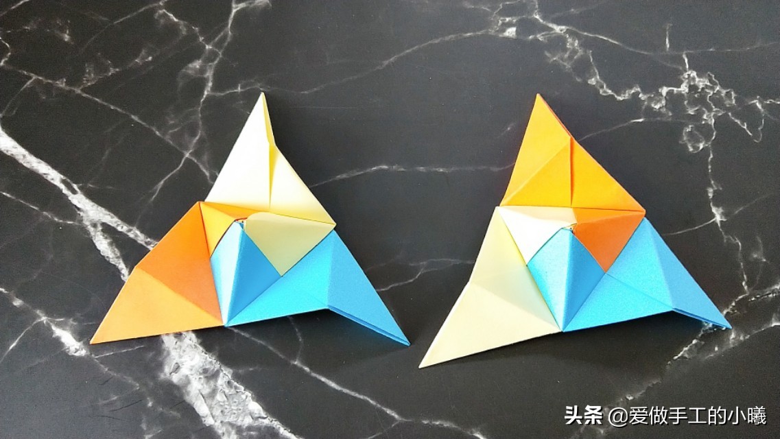 好玩的折纸旋转陀螺有一点点复杂,不用胶水就可以折的陀螺