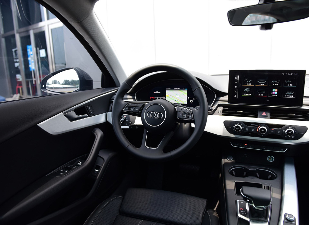 奥迪a4l乞丐版值得购买吗,全款买奥迪a4l豪华动感送什么