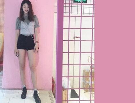 田径美女腹部纹身引争议,田径美女走红图片